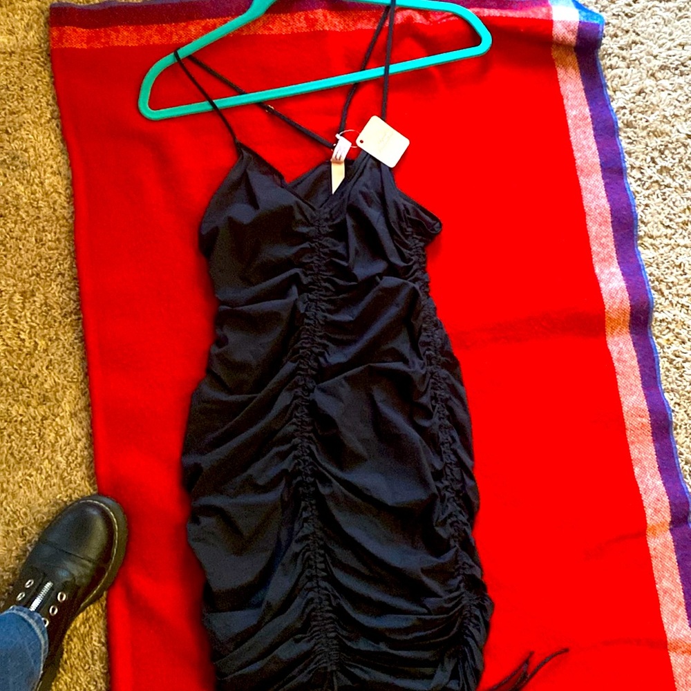 New with tags.Size 4 sheer lingerie, or party dress. Sexy with ties.